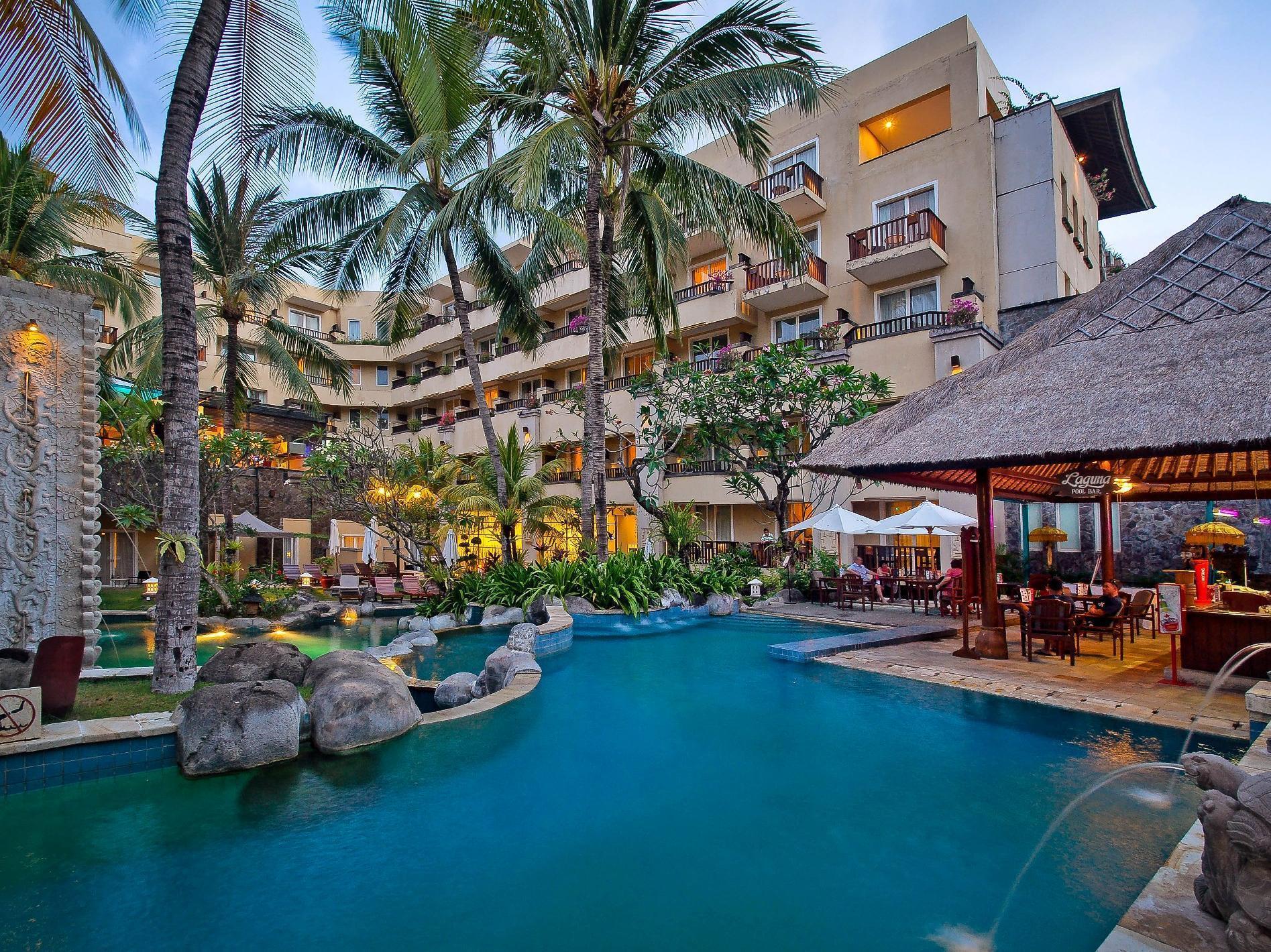 Kuta Paradiso Hotel Bagian luar foto The pool at the hotel