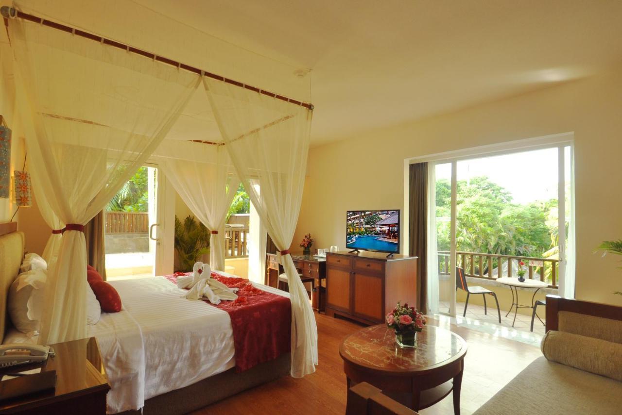Kuta Paradiso Hotel Bagian luar foto Deluxe Room